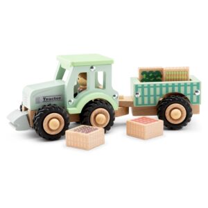 Houten tractor met aanhanger en groente