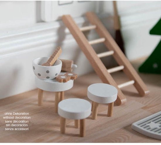 goki-elfendeur-kerst-magisch-speelgoed.jpg Houten elfendeur van Goki tegen muur in kinderkamer